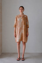 Foro dress in an earth tone, full-length front view