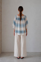 Valenza blouse in blue check, full-length back view