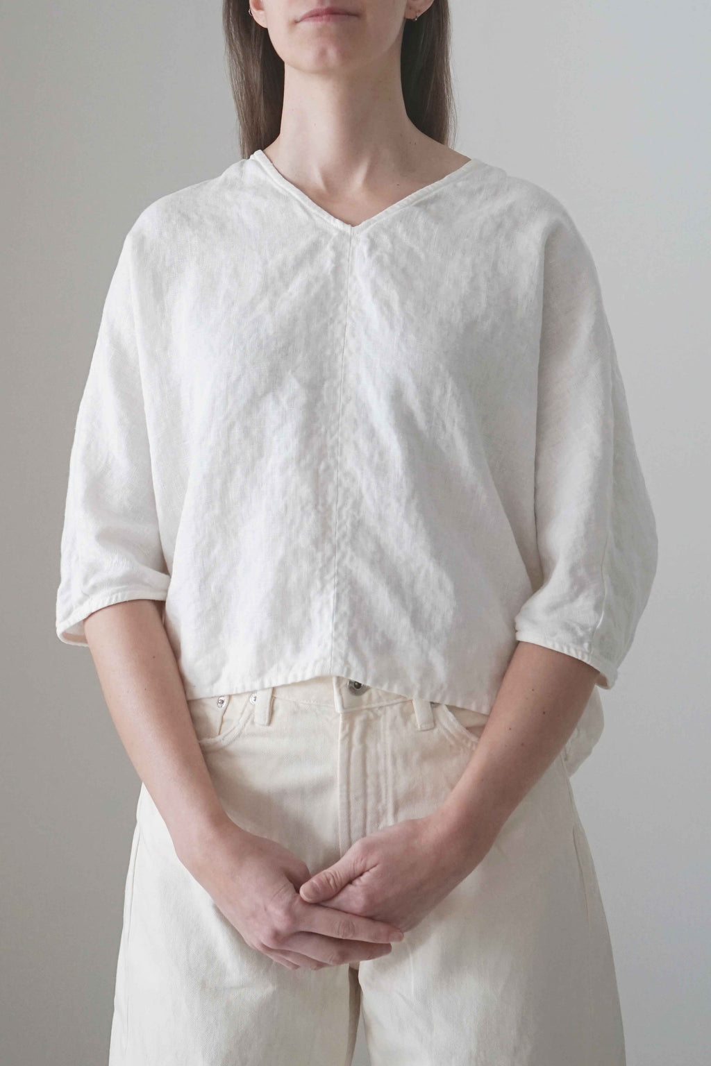 Marei blouse in white, front view with V-neckline