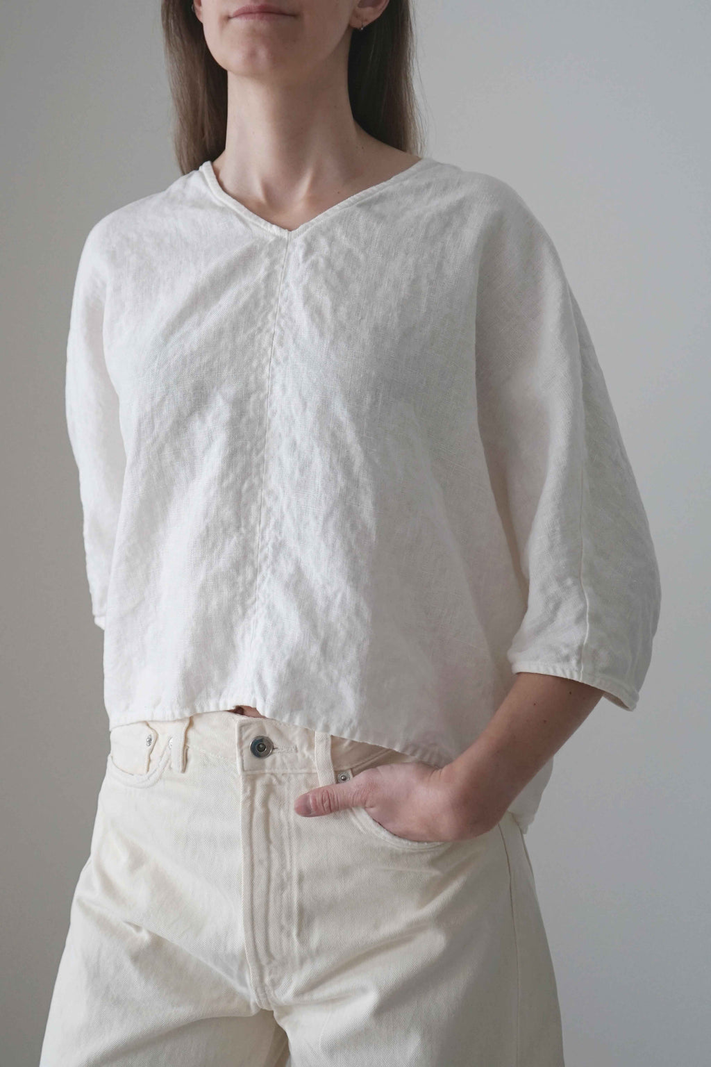 Marei blouse in white, three-quarter front view