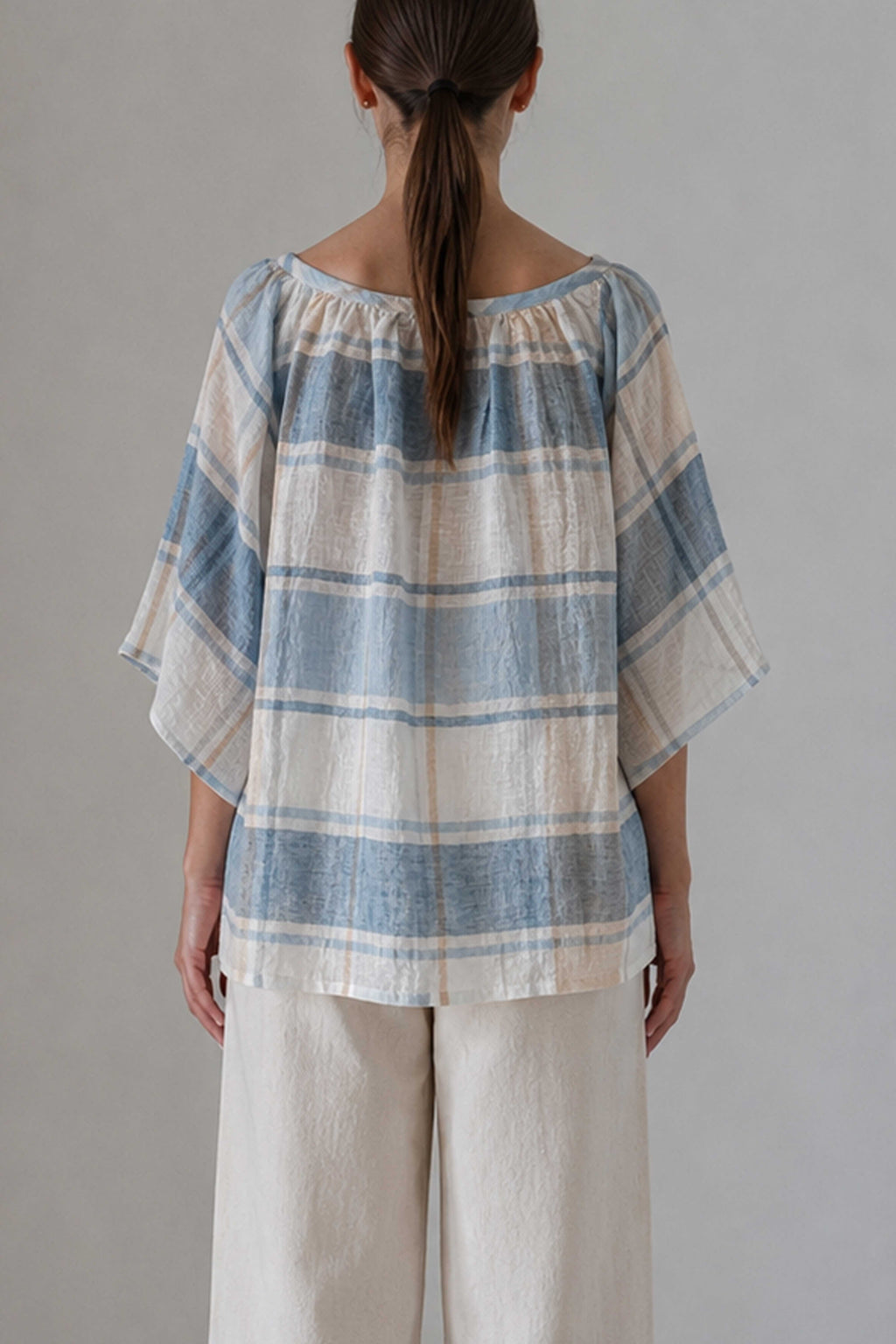 Valenza blouse in blue check, back view