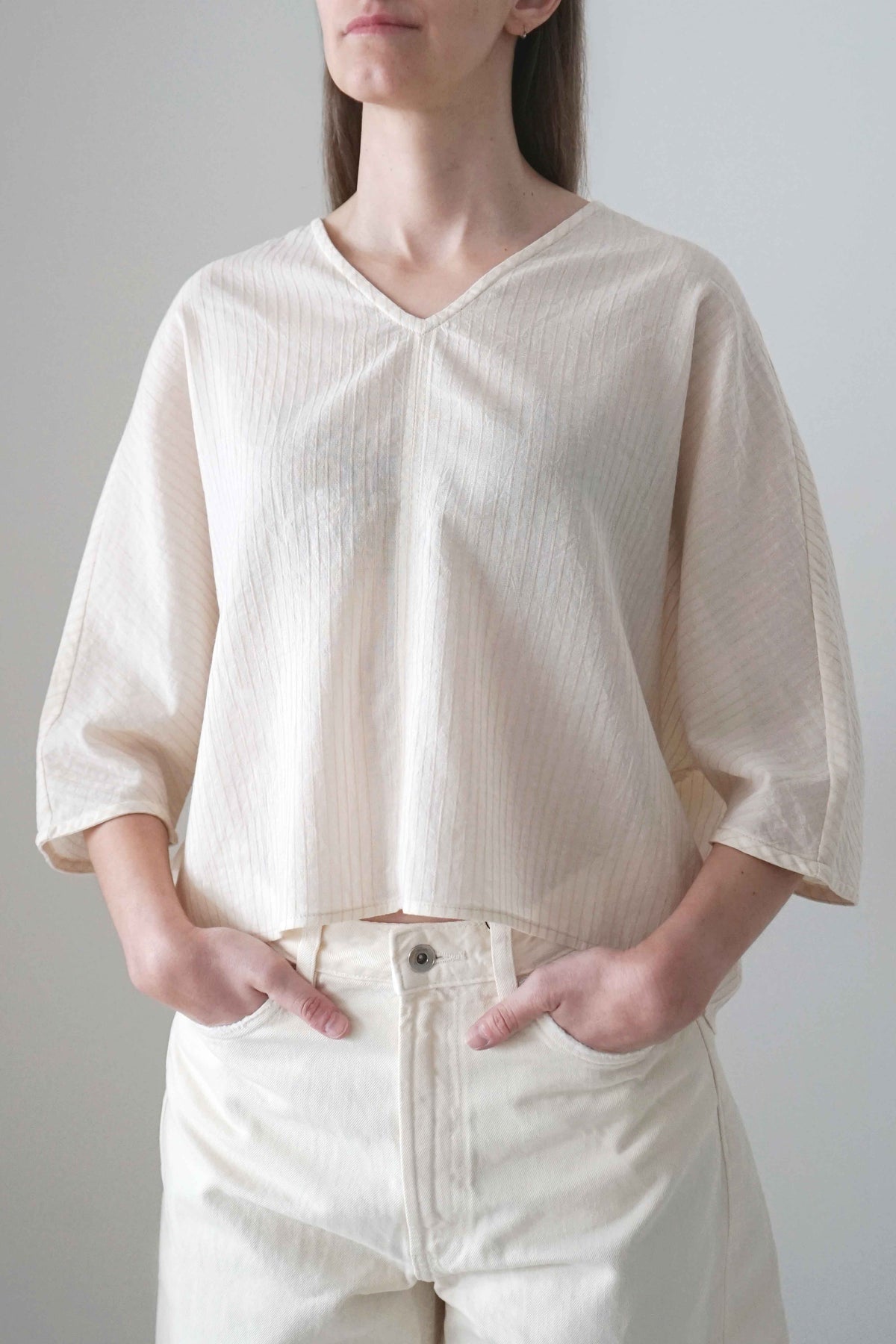Marei blouse in beige fine stripes, front view