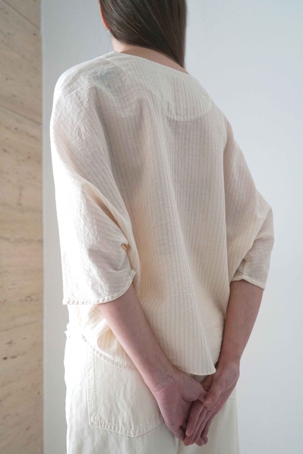 Marei blouse in beige, three-quarter back view