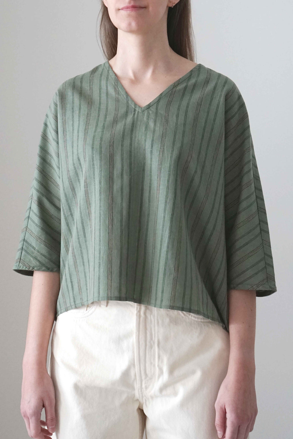 Marei blouse in green stripes, front view