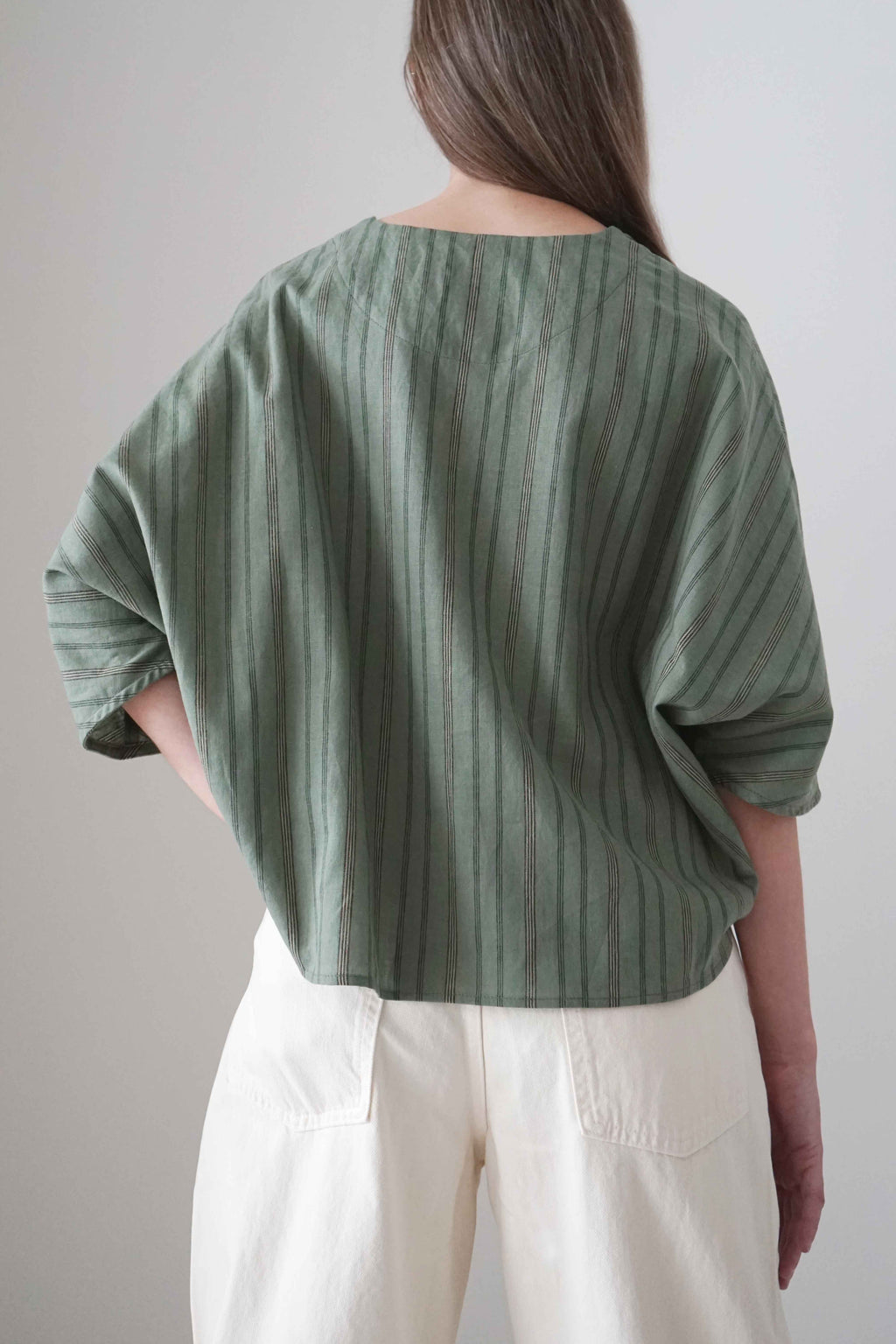 Marei blouse in green stripes, back view