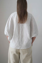 Blusa Emes a rayas grises, vista trasera