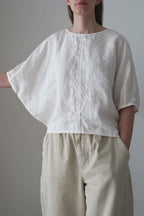 Emes blouse in white, front view showing the batwing sleeve